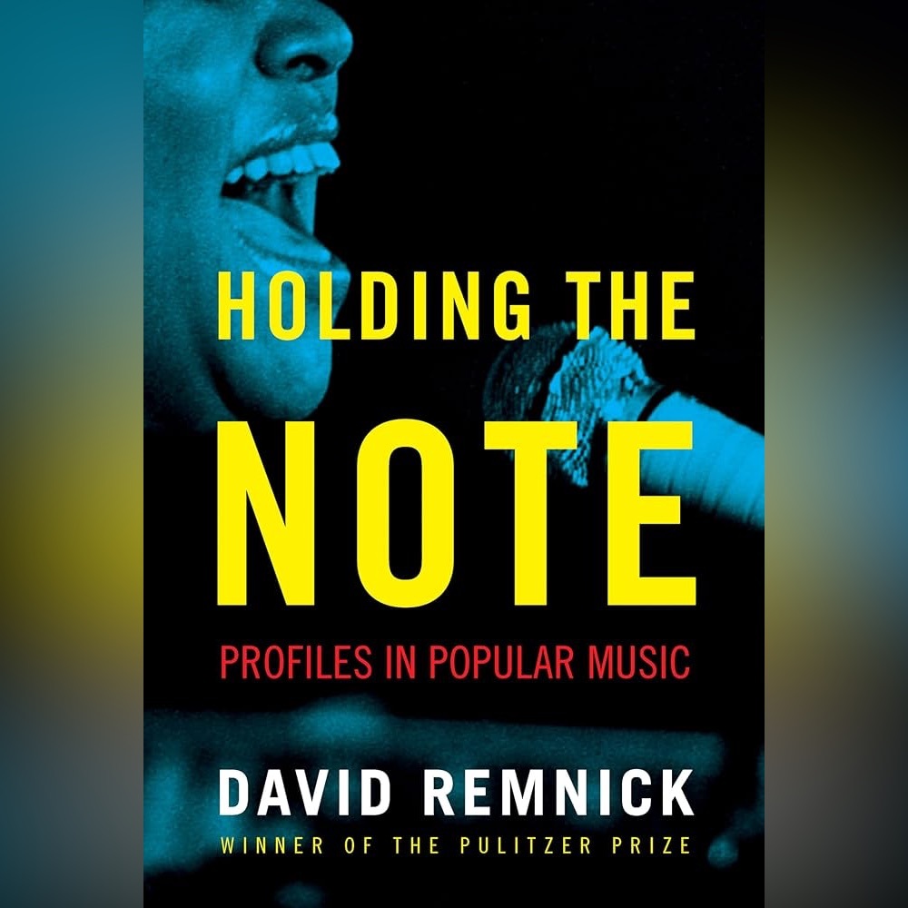 Holding The Note Book